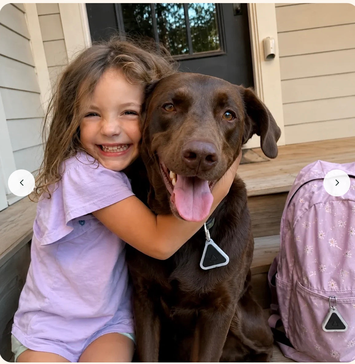 Girl hugging her dog — Eoka Clip on the collar and backpack