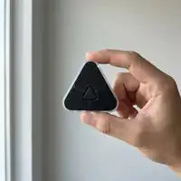 Customer photo — the clip in hand, smaller than you'd think